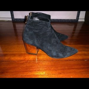 Black and gold Steve Madden booties